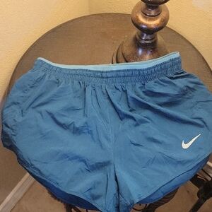Nike Women's Teal Shorts with White Swoosh
